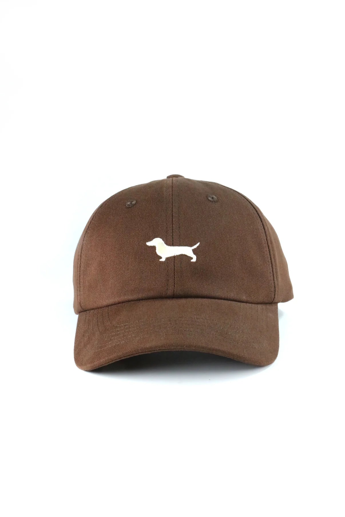 Brown cap with a white dog logo