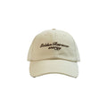 Beige cap with 'Golden Retriever energy' text on a white background