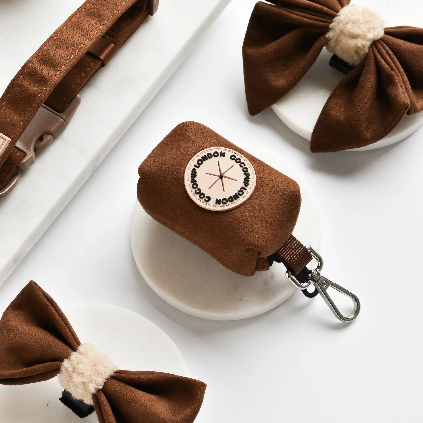 Brown suede poop bag holder