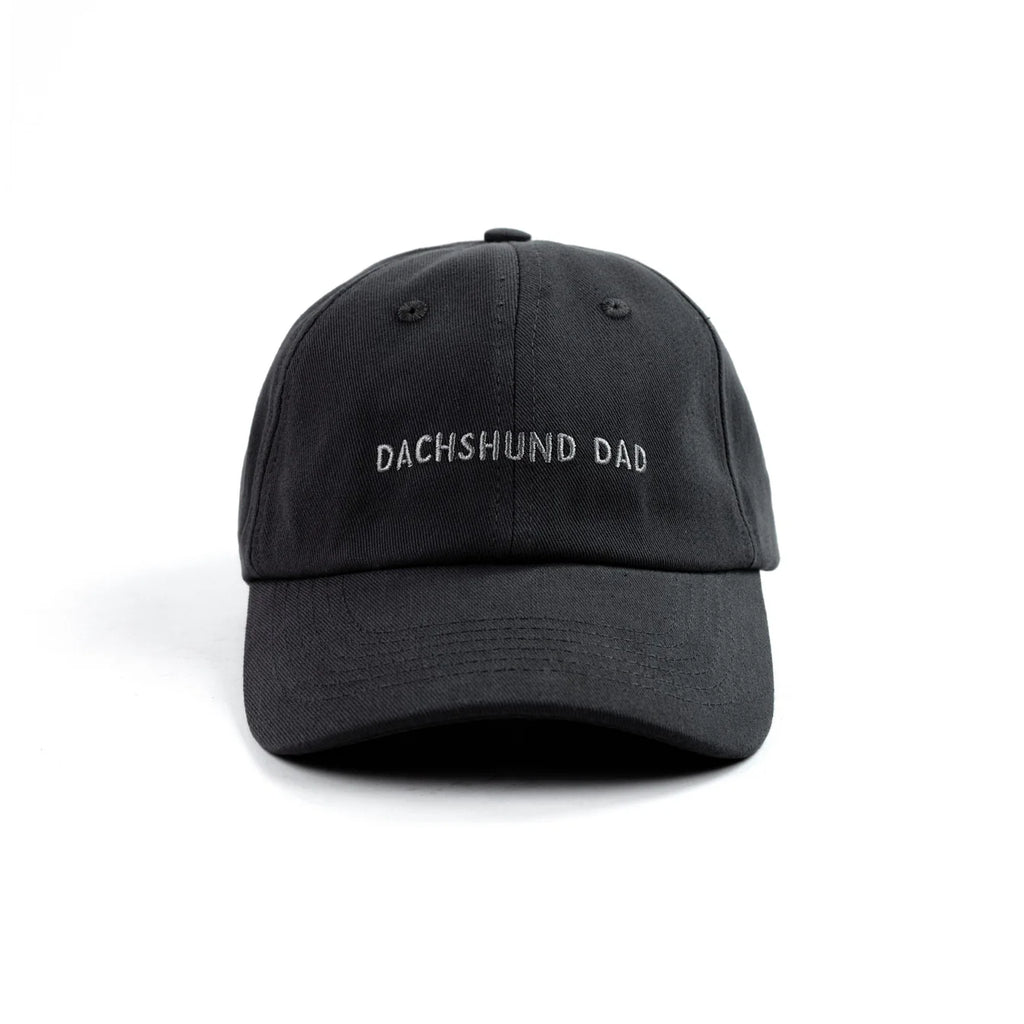 Black cap with 'DACHSHUND DAD' text on a white background
