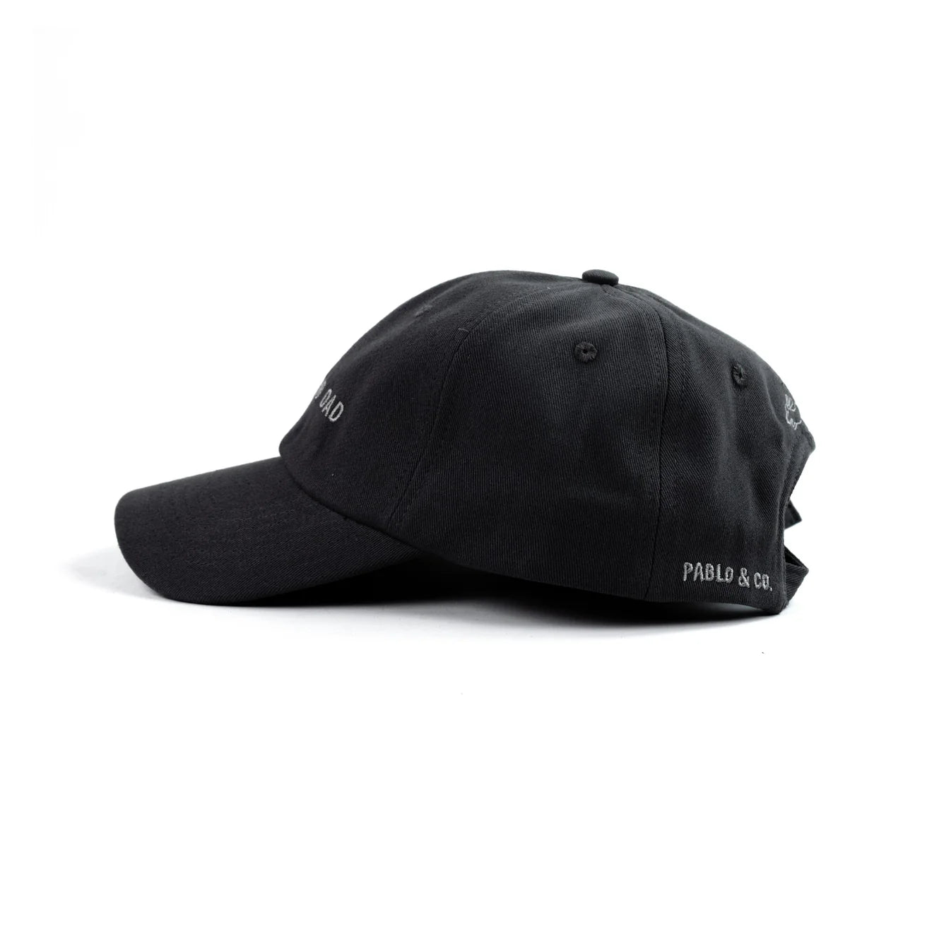Black cap with 'Pablo & Co.' branding on a white background