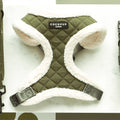 Green quilted dog harness with white fleece lining and COCOPUP branding on a white background