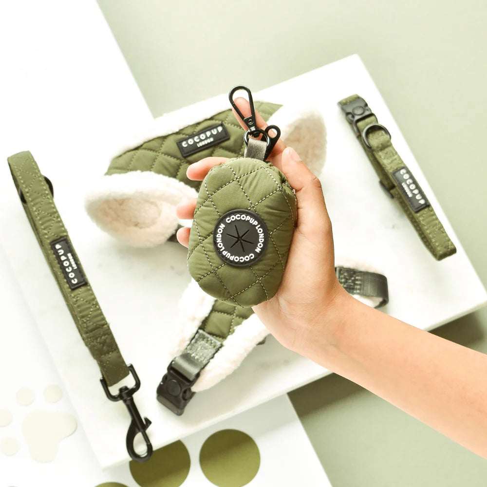Green pet accessories including a collar, harness and poop bag holder