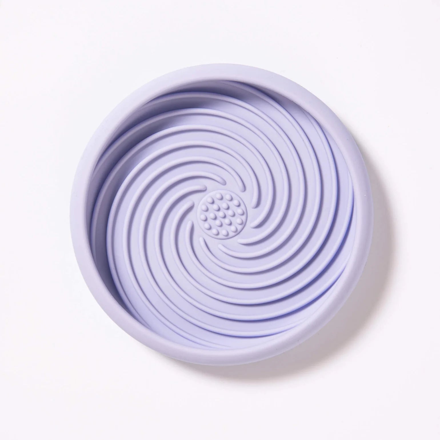Purple silicone lick mat with textured design, for pets