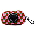 Pink patterned poop bag holder with a black clip and 'Pablo & Co.' logo on a white background