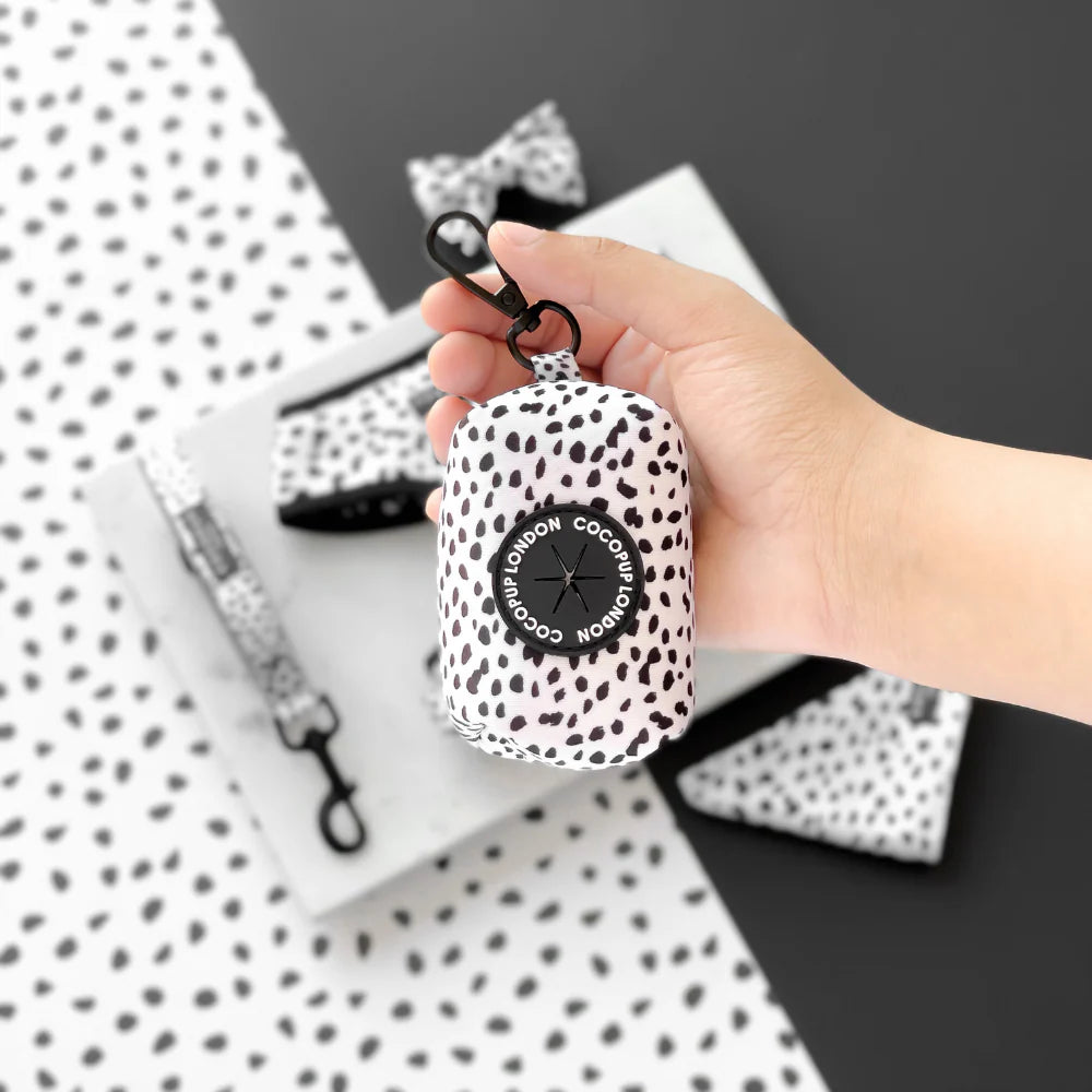 Black and white spotted poop bag holder