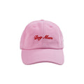 Pink cap with 'Dog Mum' text on a white background
