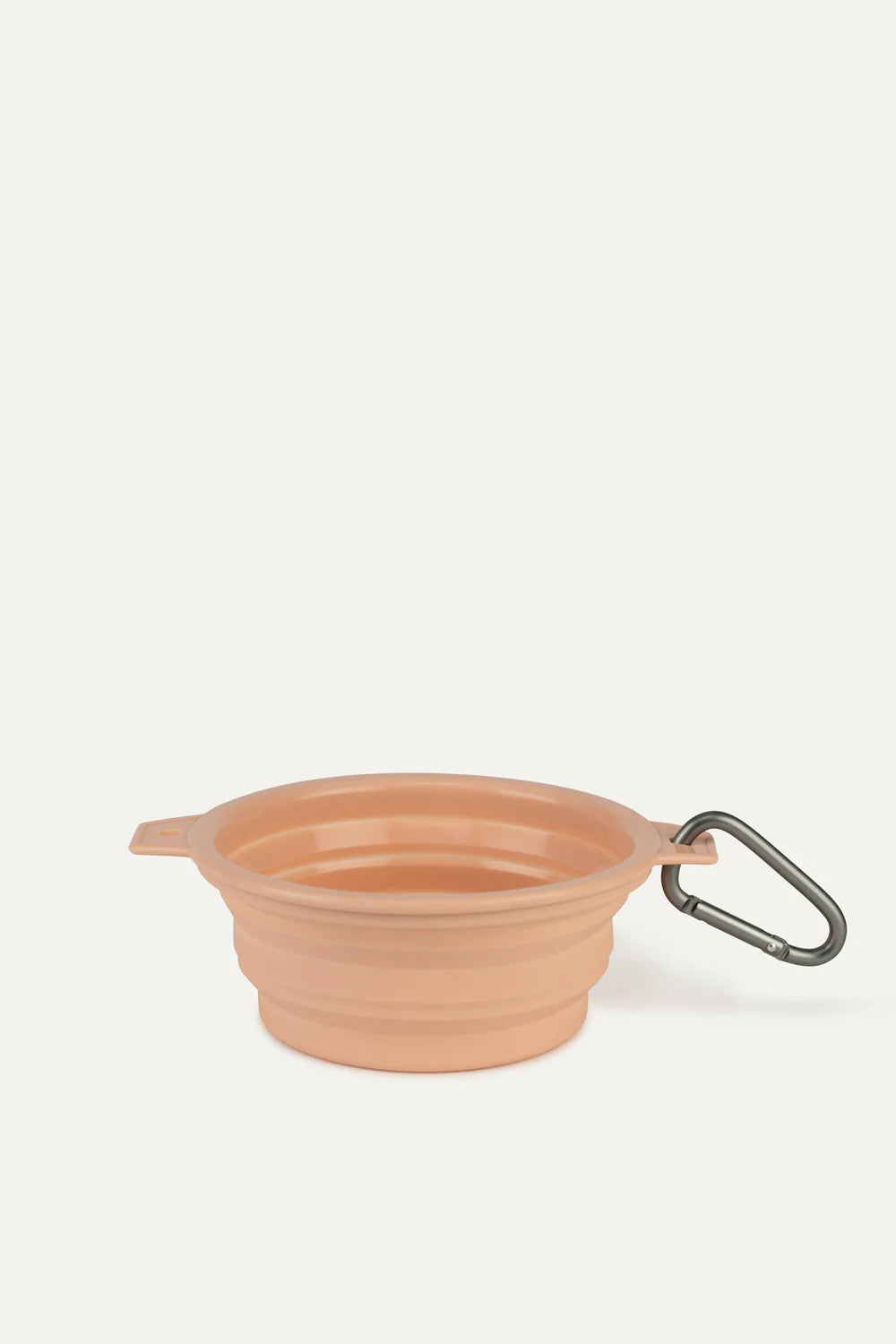 Collapsible peach colour travel dog bowl with a carabiner